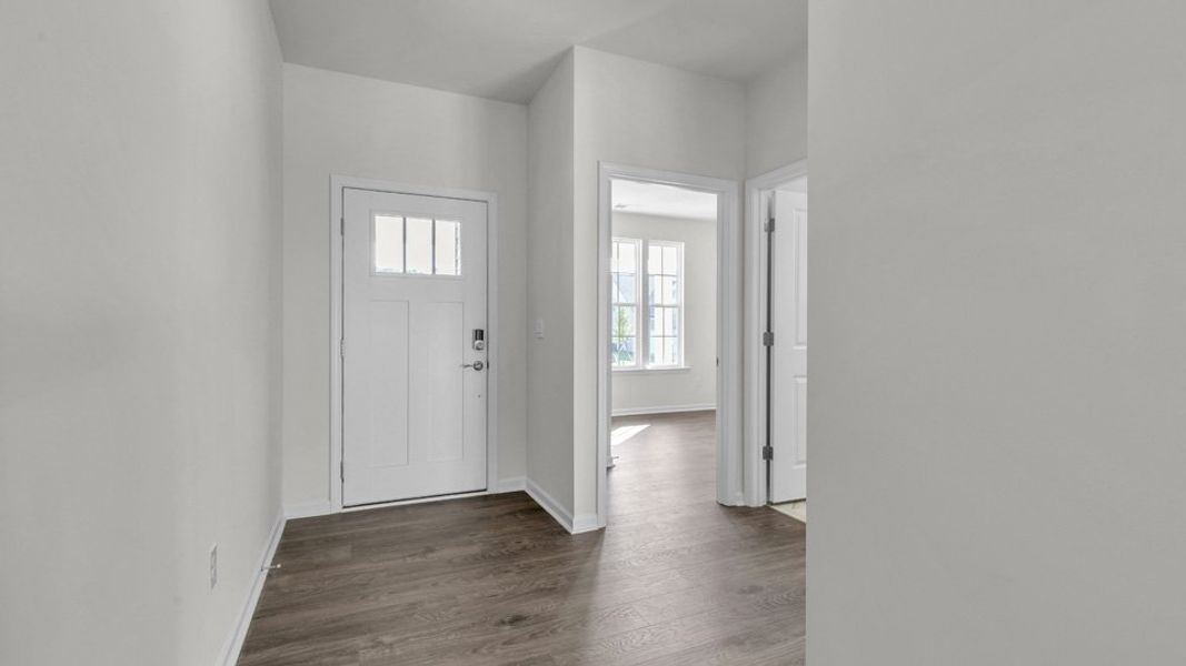 Representative unfurnished interior of a home built from the CLIFTON by D.R. Horton in The Villas at Galvins Ridge, Sanford (Image 14). Representative unfurnished interior of a home built from the CLIFTON by D.R. Horton in The Villas at Galvins Ridge, Sanford (Image 14).
