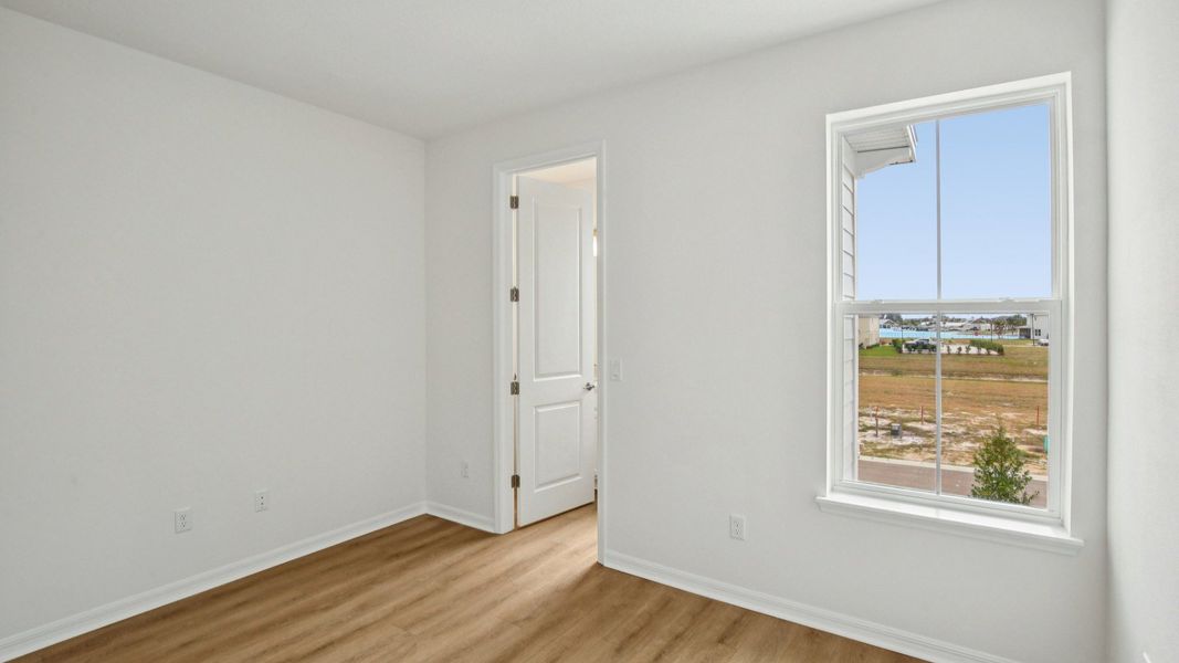 Furnished interior view inside a new home in Isla Mirada, San Antonio (Image 21).