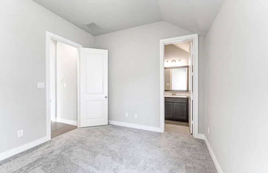 Representative unfurnished interior of a home built from the 2909 by Ravenna Homes in The Woodlands Hills 65′, Willis (Image 37). Representative unfurnished interior of a home built from the 2909 by Ravenna Homes in The Woodlands Hills 65′, Willis (Image 37).