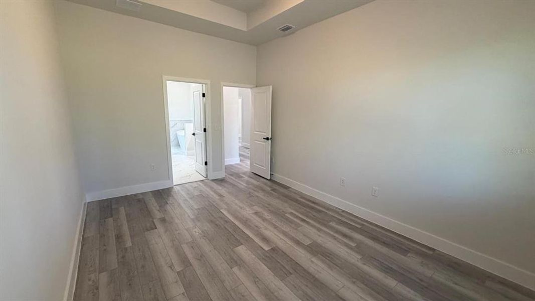 Spacious, unfurnished interior of a new home in , Port Charlotte (Image 34).