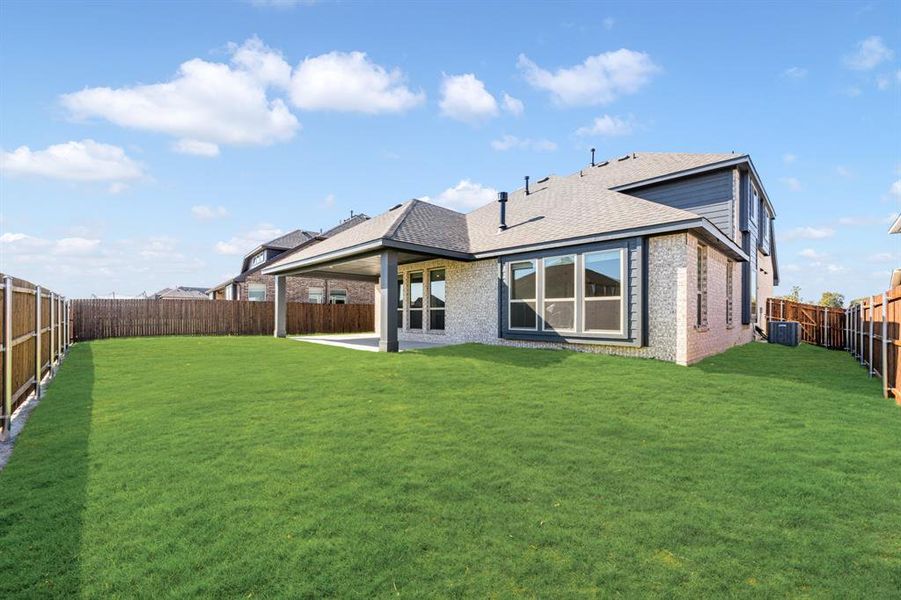 Exterior details and patio area of a home in The Oaks, Red Oak (Image 3). Exterior details and patio area of a home in The Oaks, Red Oak (Image 3).
