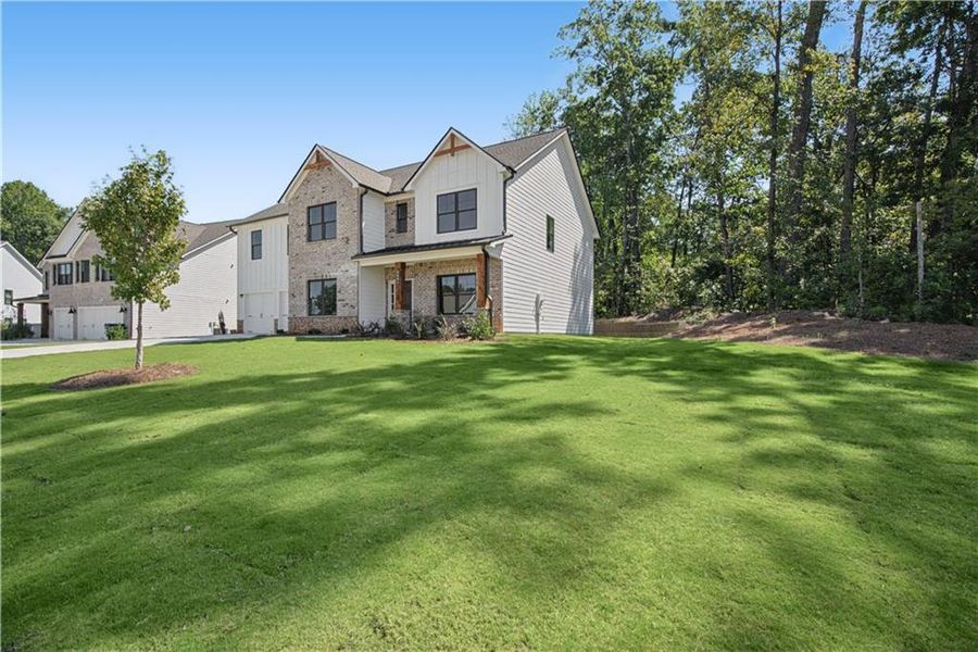 Exterior details and patio area of a home in Springside Reserve, Powder Springs (Image 3).