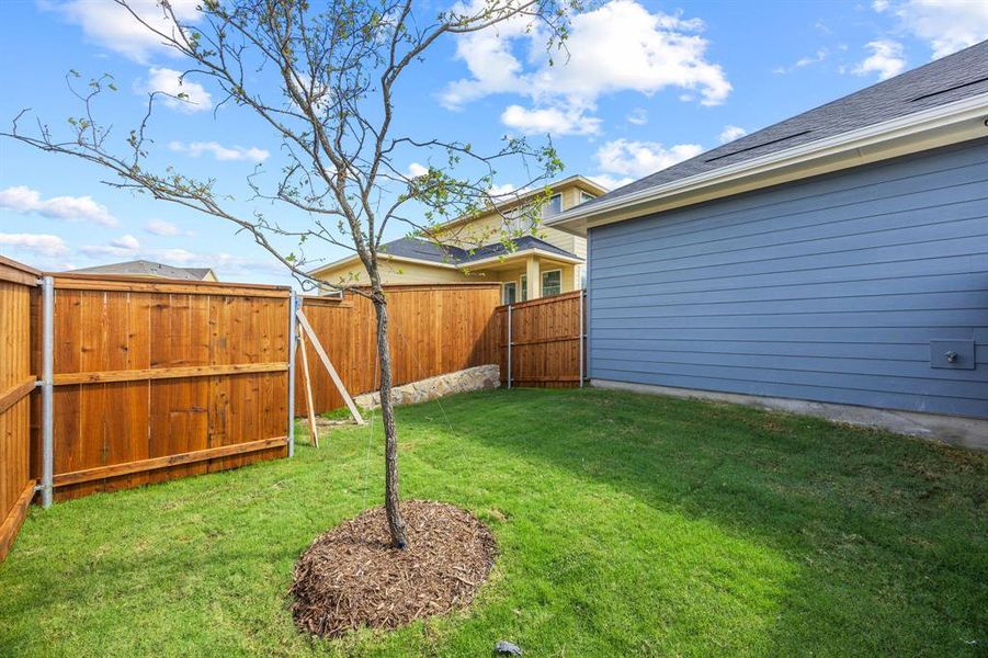 Exterior details and patio area of a home in The Heights at Uptown Celina, Celina (Image 17). Exterior details and patio area of a home in The Heights at Uptown Celina, Celina (Image 17).