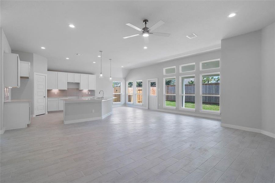 Discover the convenience of this spacious indoor utility room, designed to streamline your daily tasks! Featuring a dedicated area for laundry, this functional space is both practical and organized. With easy access to essential appliances, including a washer and dryer, you'll enjoy efficiency at your fingertips.