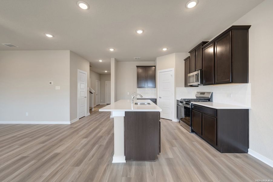 Furnished interior view inside a new home in Winding Brook, San Antonio (Image 13).