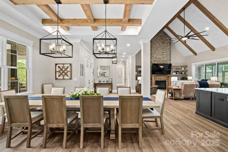 Dining Room w/coffered ceiling and wood beams.