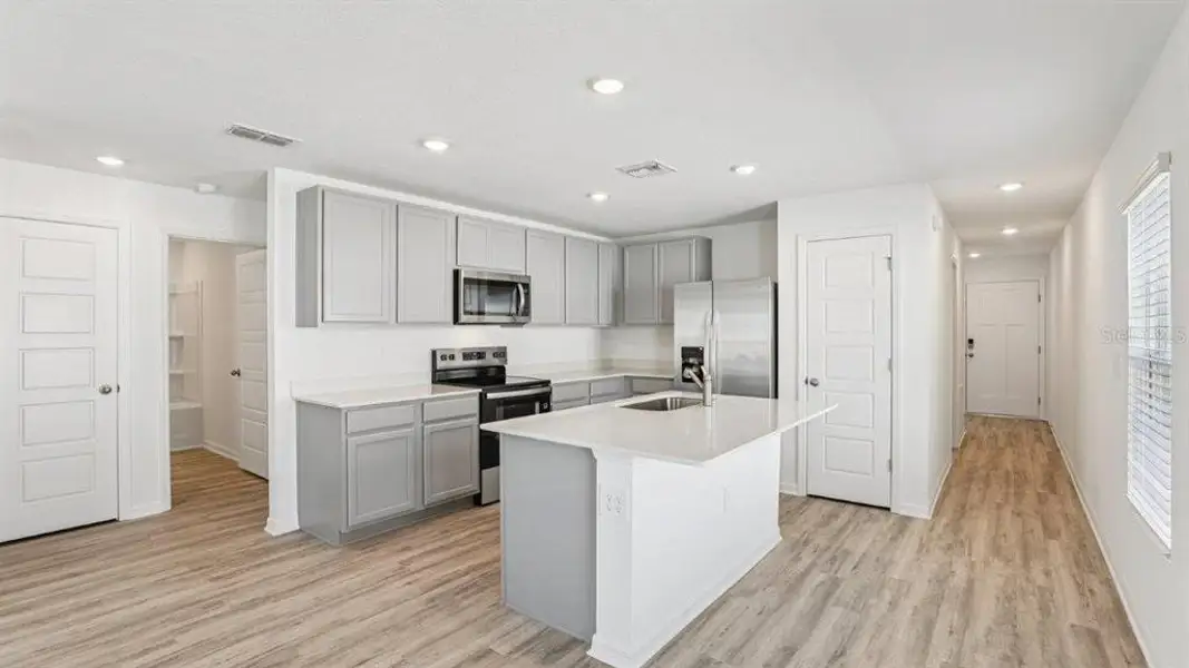 Furnished interior view inside a new home in Villamar, Winter Haven (Image 9).