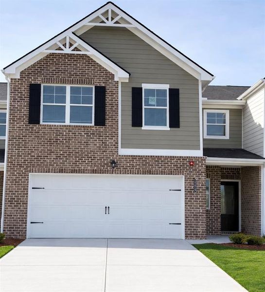 Front exterior of a new home in Chastain Heights, Woodstock, GA, highlighting curb appeal (Image 23).