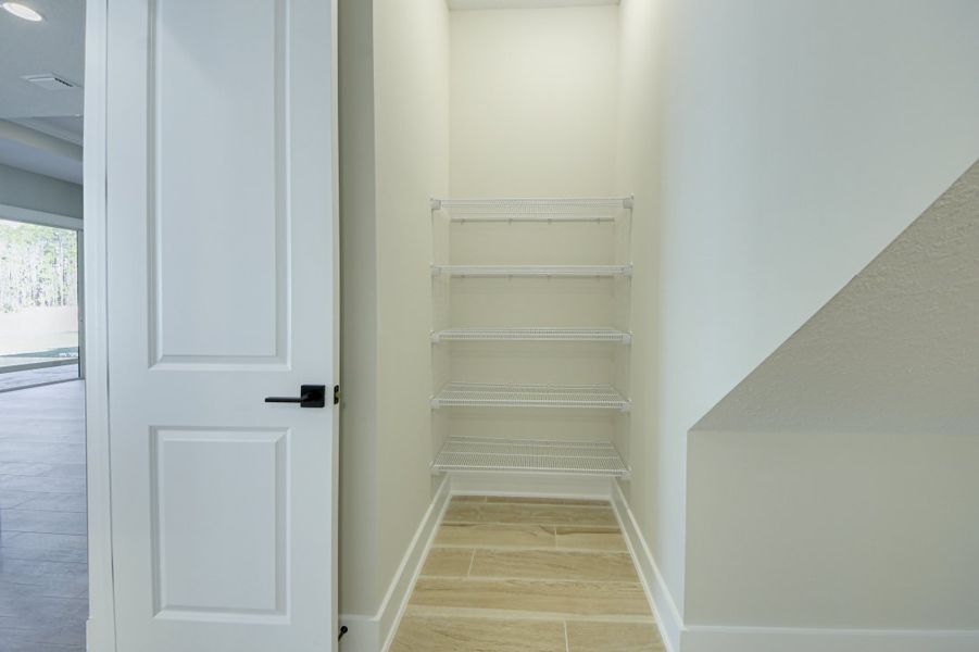 Representative unfurnished interior of a home built from the Julington by Riverside Homes in Hidden Creek at SilverLeaf 70' Series, St. Augustine (Image 14).