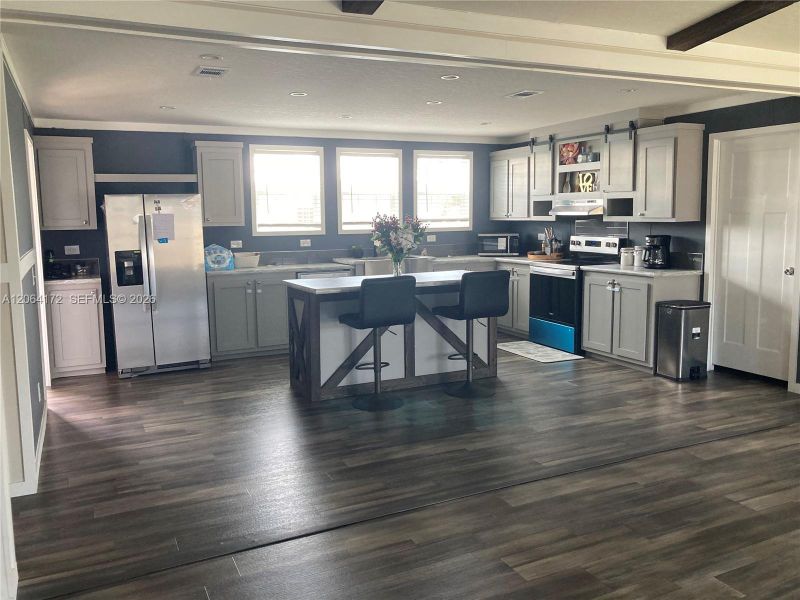 Furnished interior view inside a new home in , Clewiston (Image 4).