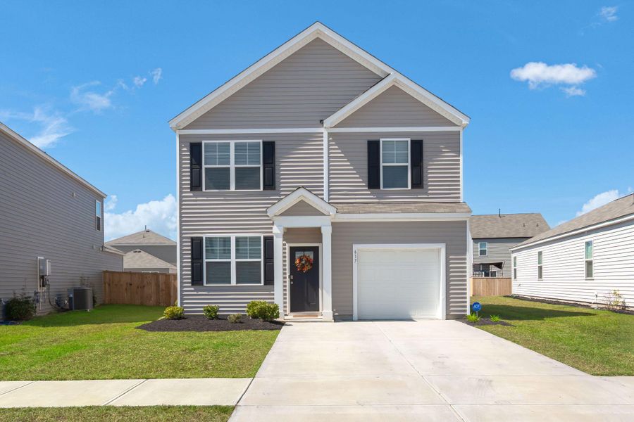 Front exterior of a new home in , Summerville, SC, highlighting curb appeal (Image 22).