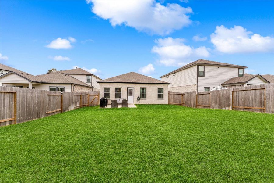 Exterior details and patio area of a home in , Magnolia (Image 4).