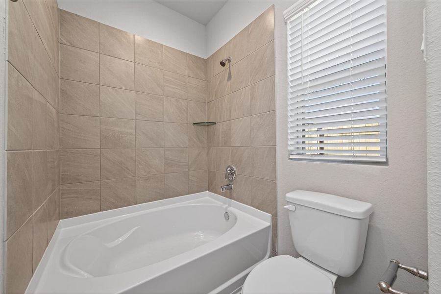 Furnished interior view inside a new home in Woodland Lakes, Houston (Image 8).