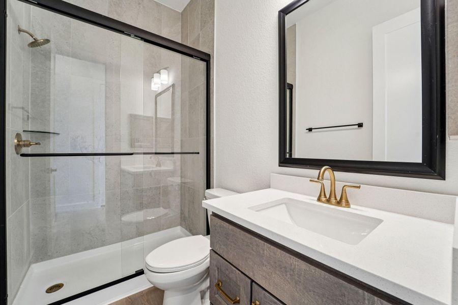 Furnished interior view inside a new home in The Woodlands Hills, Willis (Image 11).