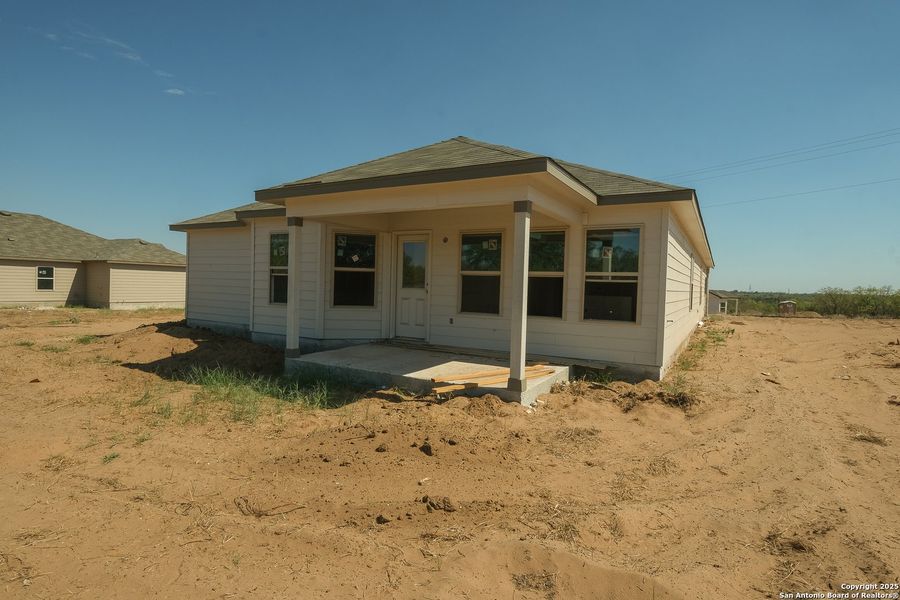 Exterior details and patio area of a home in Chaparral Ranch, Floresville (Image 17). Exterior details and patio area of a home in Chaparral Ranch, Floresville (Image 17).
