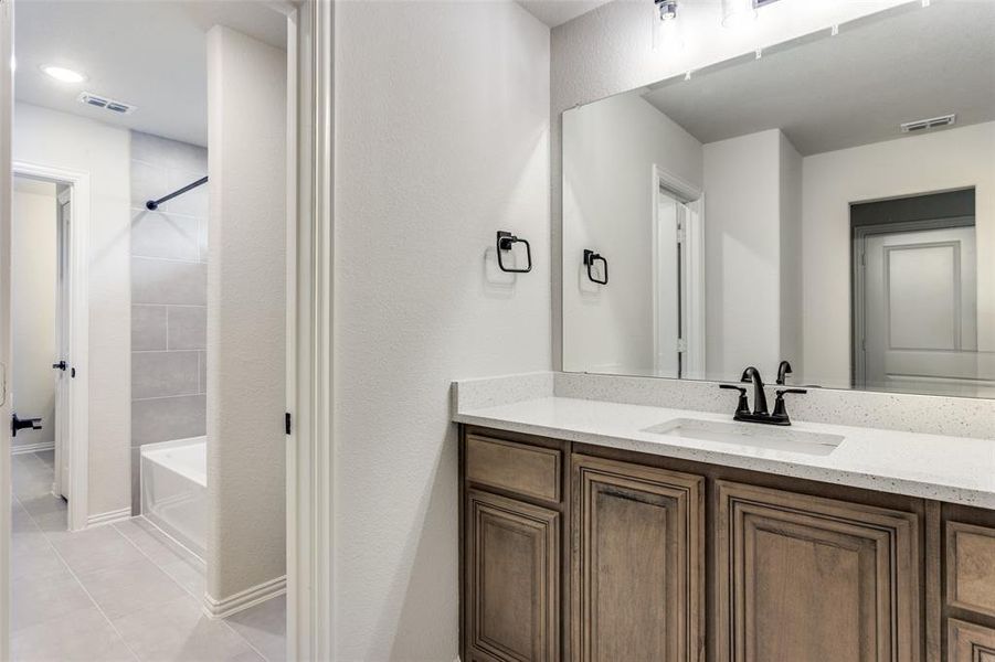 Furnished interior view inside a new home in Mockingbird Hills 60-65, Joshua (Image 5).