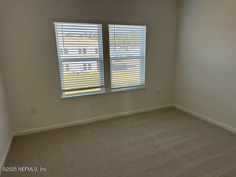 Spacious, unfurnished interior of a new home in Brook Forest - Villas, St. Augustine (Image 17).