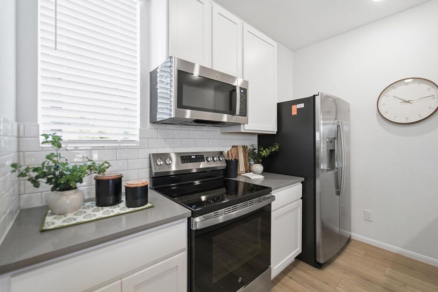 Furnished interior view inside a new home in Municipal Drive Townhomes, Leander (Image 12).