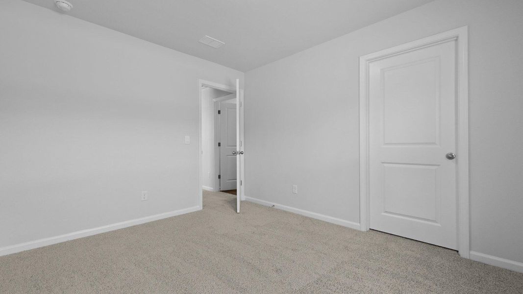 Spacious, unfurnished interior of a new home in Pine Hills at Cane Bay, Summerville (Image 23).