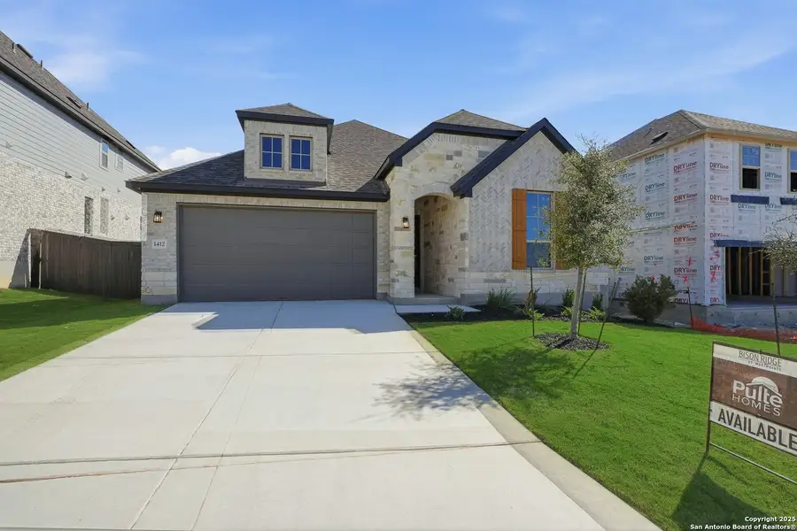 Front exterior of a new home in Bison Ridge, San Antonio, TX, highlighting curb appeal (Image 1). Front exterior of a new home in Bison Ridge, San Antonio, TX, highlighting curb appeal (Image 1).