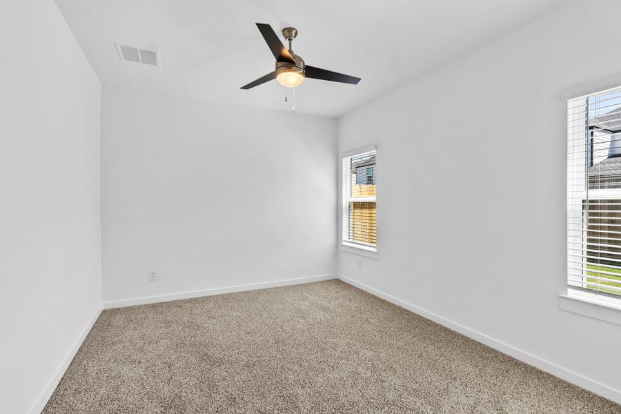 Spacious, unfurnished interior of a new home in Grand West, Houston (Image 24).
