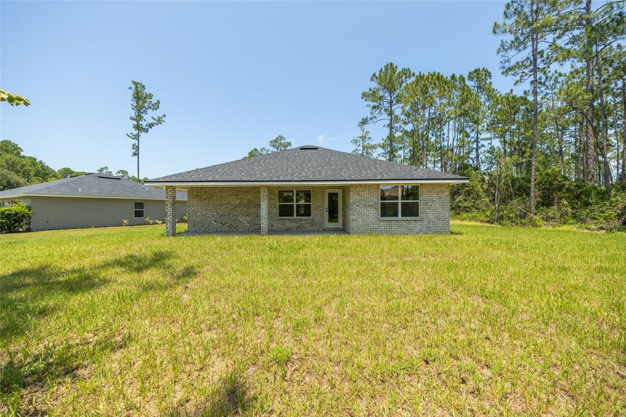 Exterior details and patio area of a home in Palm Coast, Palm Coast (Image 19).