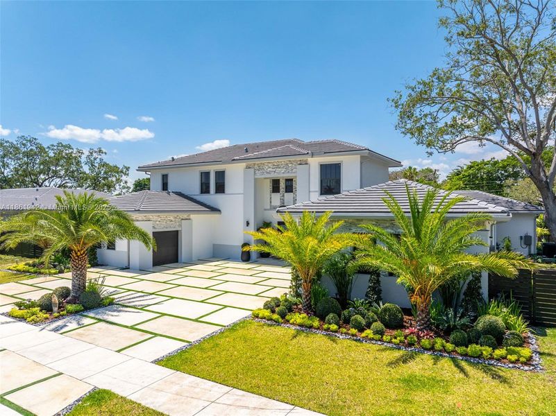 Front exterior of a new home in , Miami, FL, highlighting curb appeal (Image 31). Front exterior of a new home in , Miami, FL, highlighting curb appeal (Image 31).