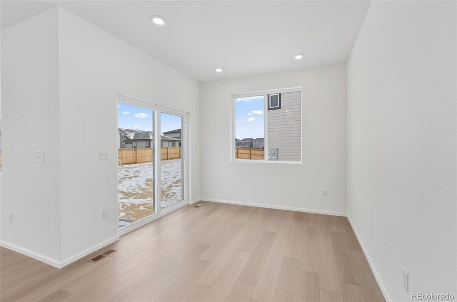 Spacious, unfurnished interior of a new home in The Cottages Collection at Ridgeline Vista, Brighton (Image 11).