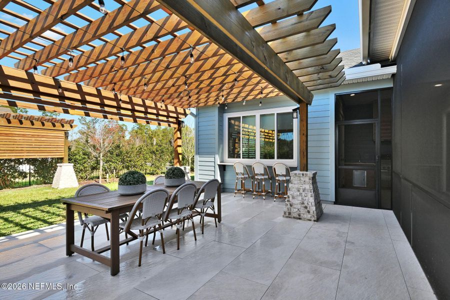 Exterior details and patio area of a home in Palmetto Cove, Ponte Vedra (Image 21).