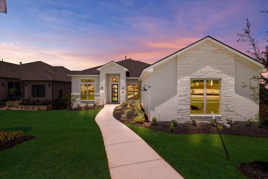Front exterior of a new home in Johnson Ranch, Bulverde, TX, highlighting curb appeal (Image 22).