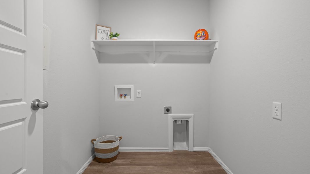 Representative furnished interior of a home built from the DENTON by D.R. Horton in Faculty Row, Abilene (Image 13).