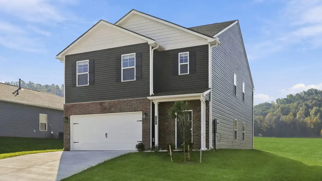 Front exterior of a new home in Fieldcrest Acres, Blountville, TN, highlighting curb appeal (Image 2). Front exterior of a new home in Fieldcrest Acres, Blountville, TN, highlighting curb appeal (Image 2).