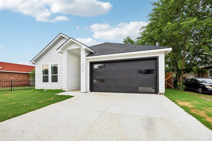 Front exterior of a new home in , Fort Worth, TX, highlighting curb appeal (Image 1). Front exterior of a new home in , Fort Worth, TX, highlighting curb appeal (Image 1).