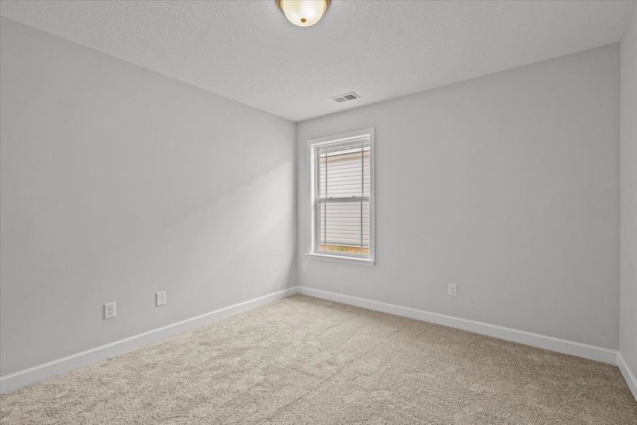 Representative unfurnished interior of a home built from the Ellison by Enchanted Homes in Hampshire Heights, Moore (Image 27).