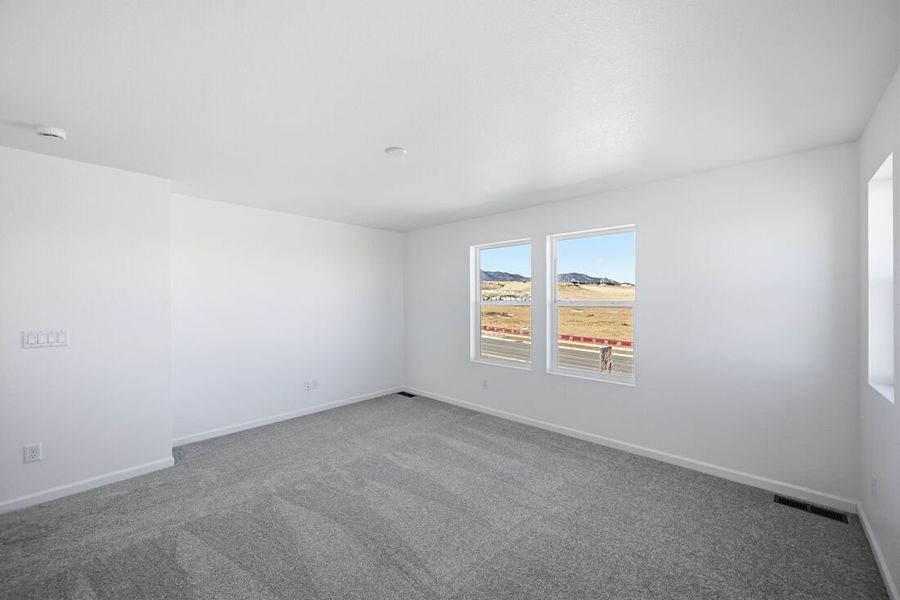Spacious, unfurnished interior of a new home in Trailstone Town Collection, Arvada (Image 24).