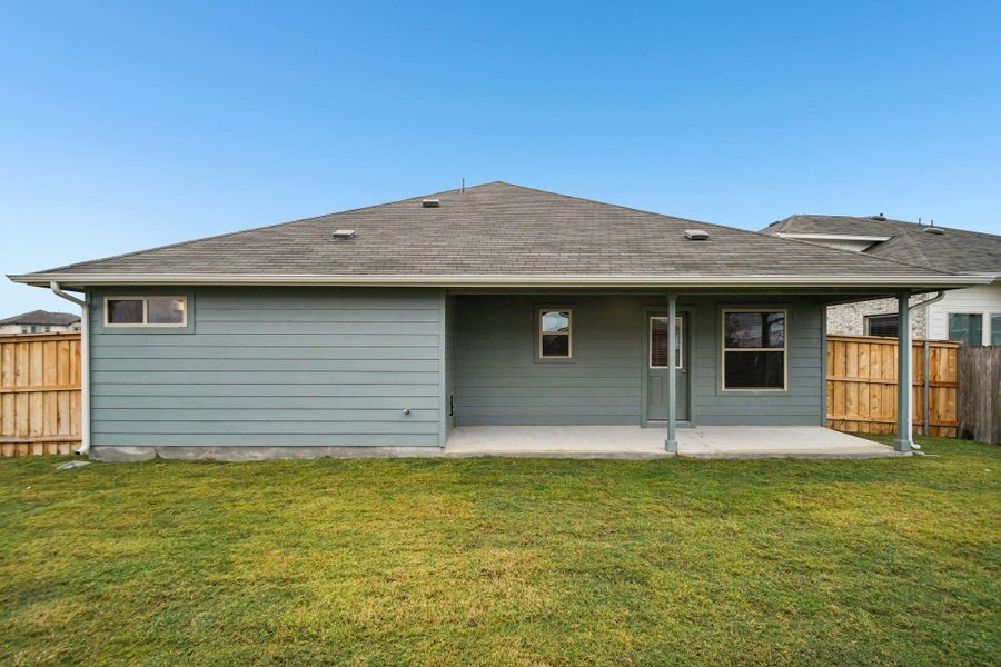 Exterior details and patio area of a home in Crosswinds, Kyle (Image 18).