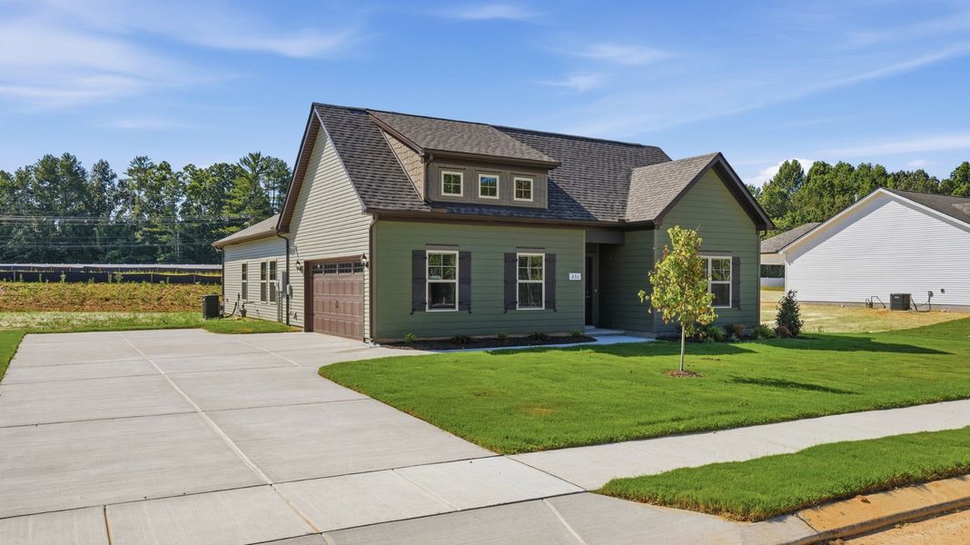Front exterior of a new home in Stillwater, Tullahoma, TN, highlighting curb appeal (Image 2). Front exterior of a new home in Stillwater, Tullahoma, TN, highlighting curb appeal (Image 2).
