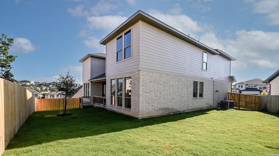 Exterior details and patio area of a home in Johnson Ranch, Bulverde (Image 18).