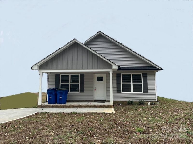 Front exterior of a new home in , Wadesboro, NC, highlighting curb appeal (Image 1).