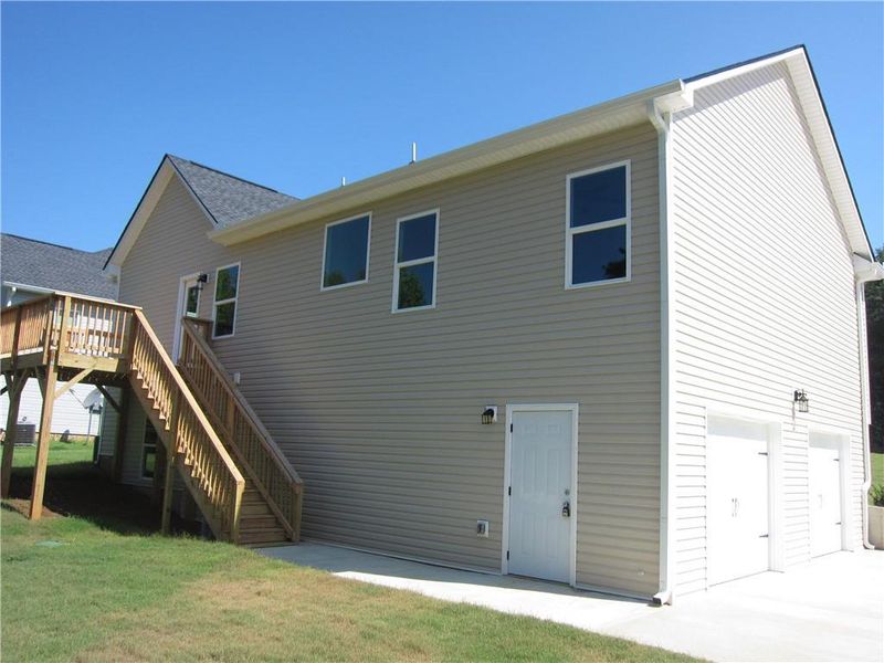 Front exterior of a new home in , Dallas, GA, highlighting curb appeal (Image 2).