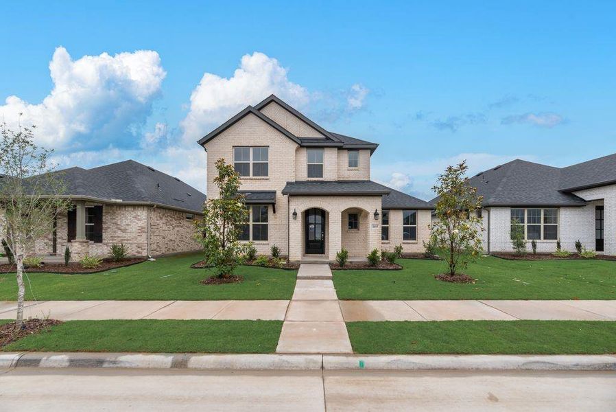 Front exterior of a new home in Bridges at Preston Crossings, Gunter, TX, highlighting curb appeal (Image 23). Front exterior of a new home in Bridges at Preston Crossings, Gunter, TX, highlighting curb appeal (Image 23).