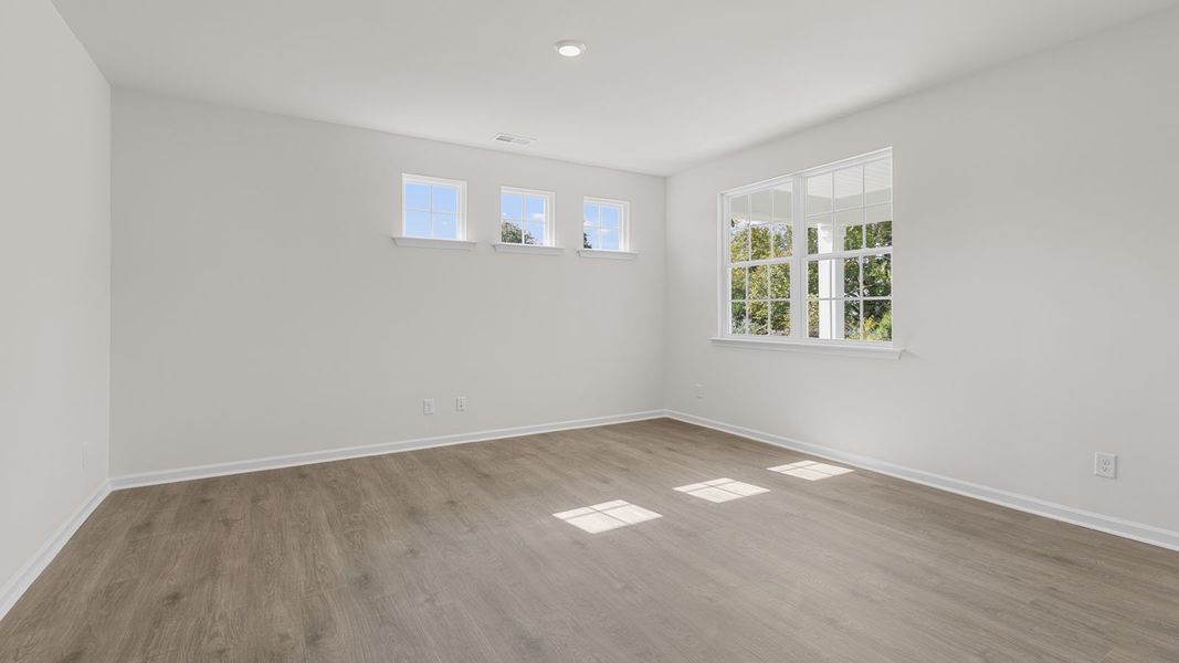 Spacious, unfurnished interior of a new home in The Villas at Kinsley, Jamestown (Image 13).