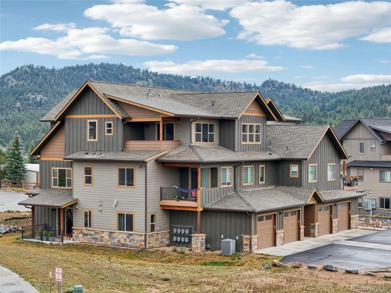 Front exterior of a new home in , Estes Park, CO, highlighting curb appeal (Image 20).