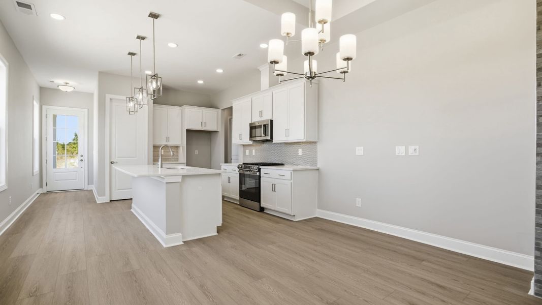 Furnished interior view inside a new home in Cresswind at Rocky River, Locust (Image 8).