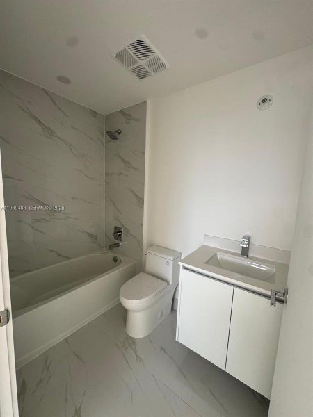 Furnished interior view inside a new home in Aria Reserve, Miami (Image 6).