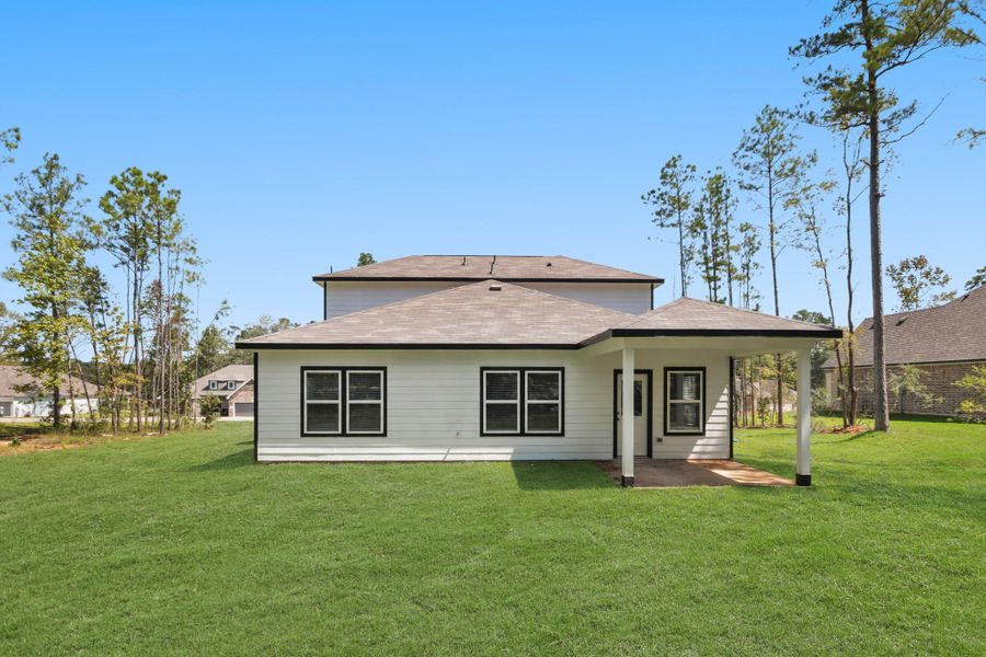 Front exterior of a new home in Oakwood Ranch, Willis, TX, highlighting curb appeal (Image 11). Front exterior of a new home in Oakwood Ranch, Willis, TX, highlighting curb appeal (Image 11).