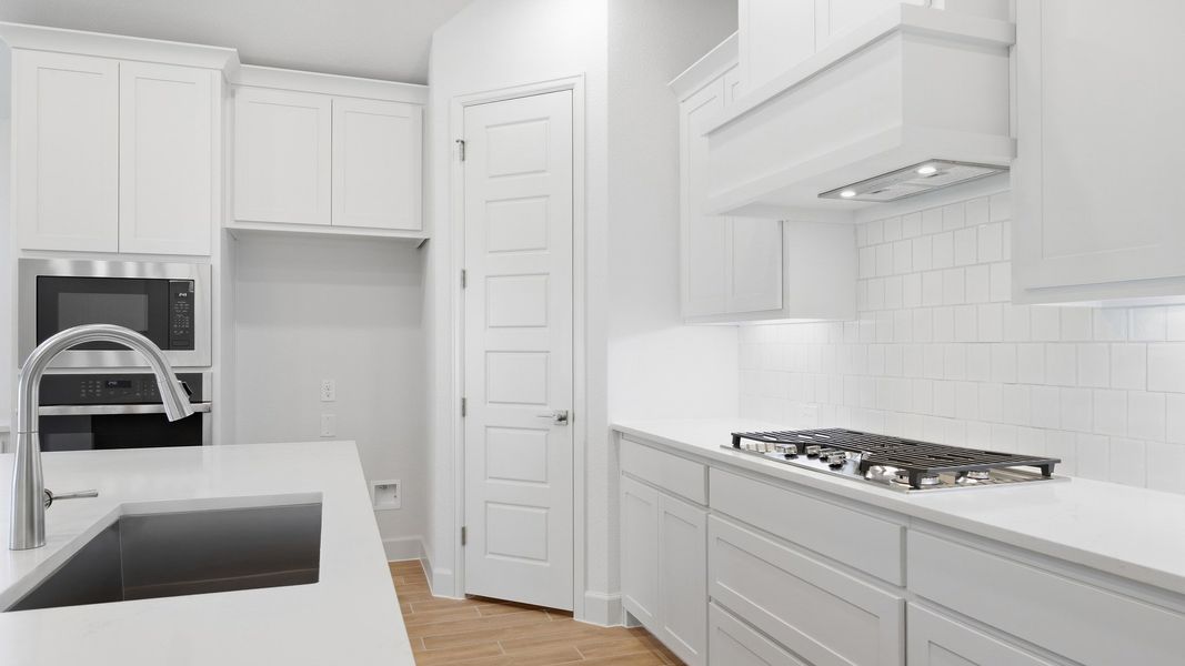 Furnished interior view inside a new home in Eliana, McKinney (Image 12).