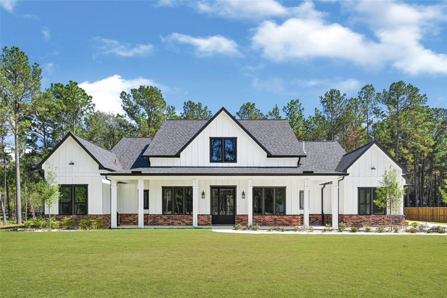 Front exterior of a new home in , Waller, TX, highlighting curb appeal (Image 22). Front exterior of a new home in , Waller, TX, highlighting curb appeal (Image 22).