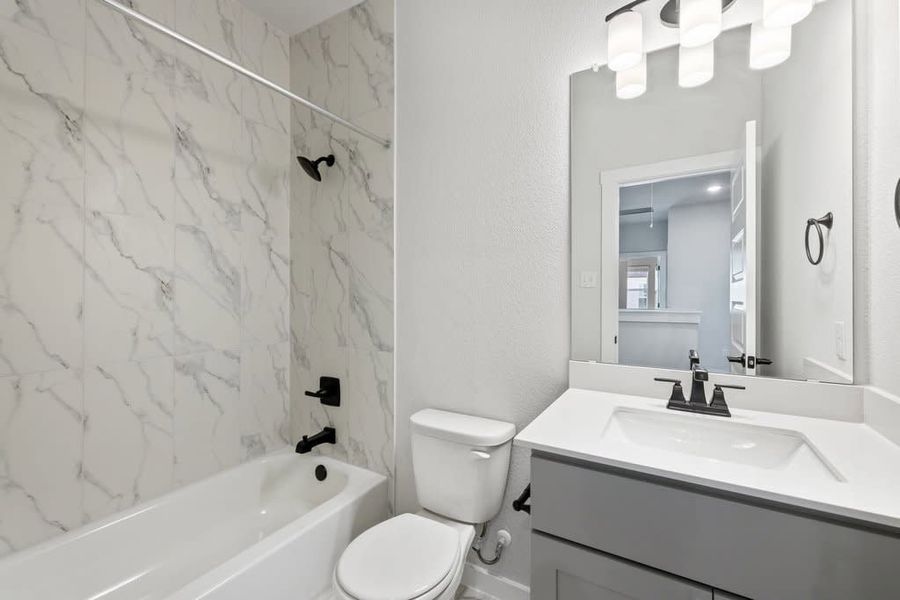 Furnished interior view inside a new home in Park Central, Georgetown (Image 14).