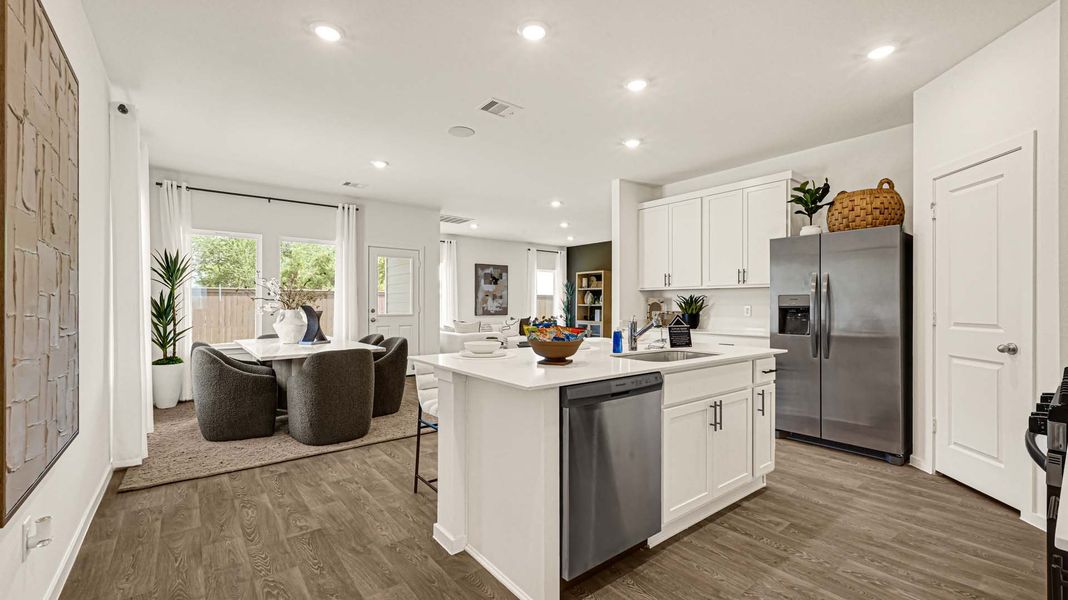 Representative furnished interior of a home built from the Sally by D.R. Horton in August Trails, Needville (Image 5).
